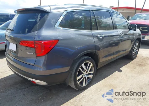 2018 Honda Pilot Touring from USA, damaged, VIN 5FNYF5H99JB021983